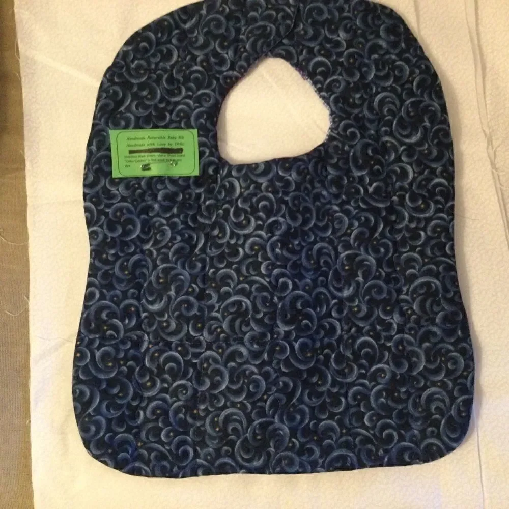 3/$25 or $12 ea.  NWT. Handmade Quilted Reversible Bib.
